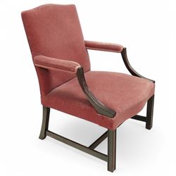 Georgian design mahogany Gainsborough chair, upholstered in pink fabric, curved and moulded arm supports, on moulded square front supports united by H-stretchers 