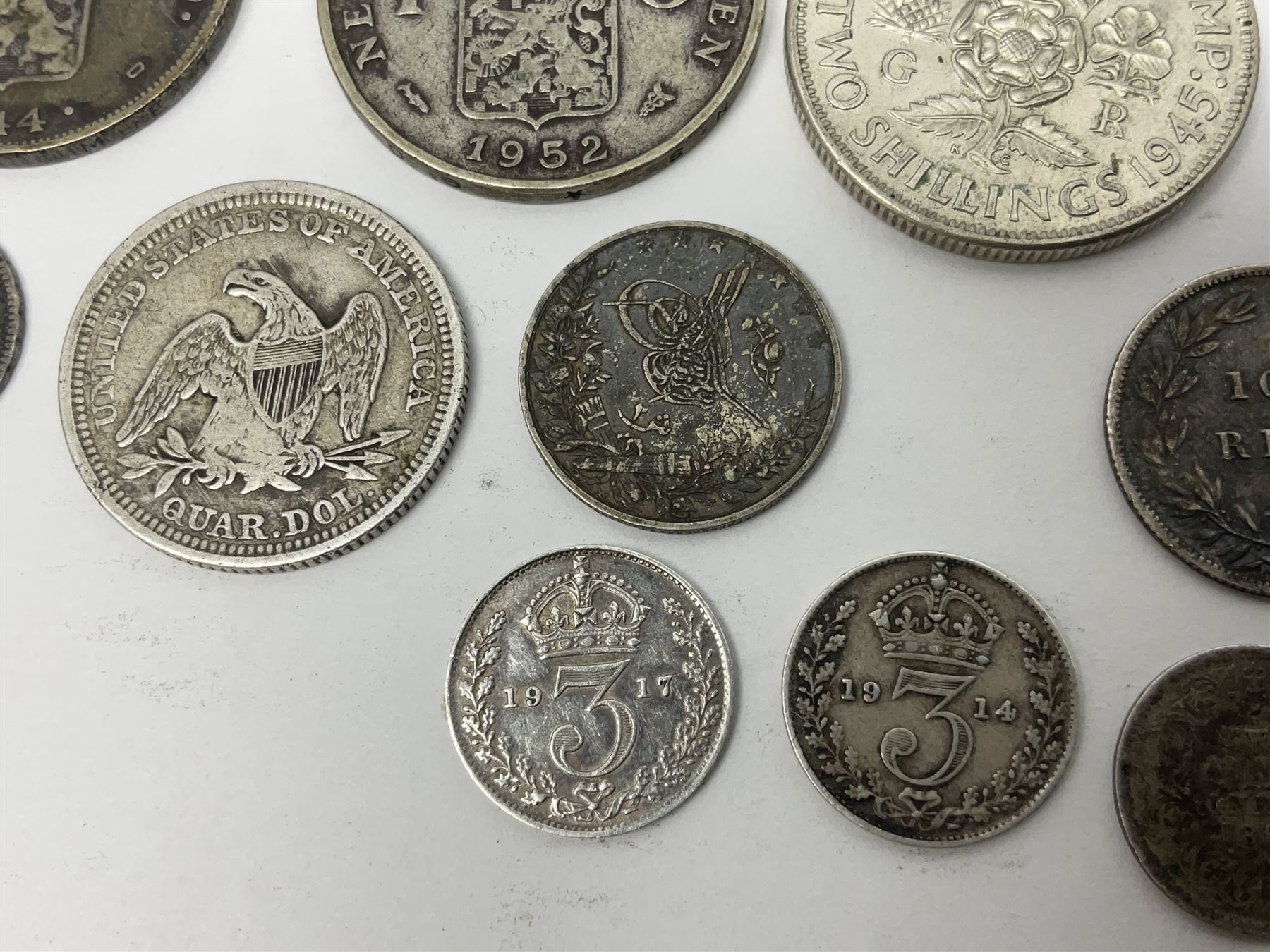 Twelve World coins, including William IIII United Colony of Demerary and Essequibo 1832 one eight guilder, United States of America 1857 quarter dollar, Tunisia 1891 one franc etc 
