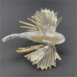 Swarovski Crystal sea creatures, comprising lion fish and dolphin, both with coloured elements, together with two seahorses, two small fish groups, butterfly fish, longnose butterfly fish and six coloured shells, tallest H8.5cm