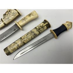 Two oriental knifes, both with bone pommel handles and bone scabbards, with scrimshaw decoration, one depicting erotic scenes