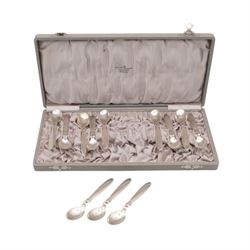 Set of twelve early 20th century Danish silver Cactus pattern demitasse spoons by Georg Je...