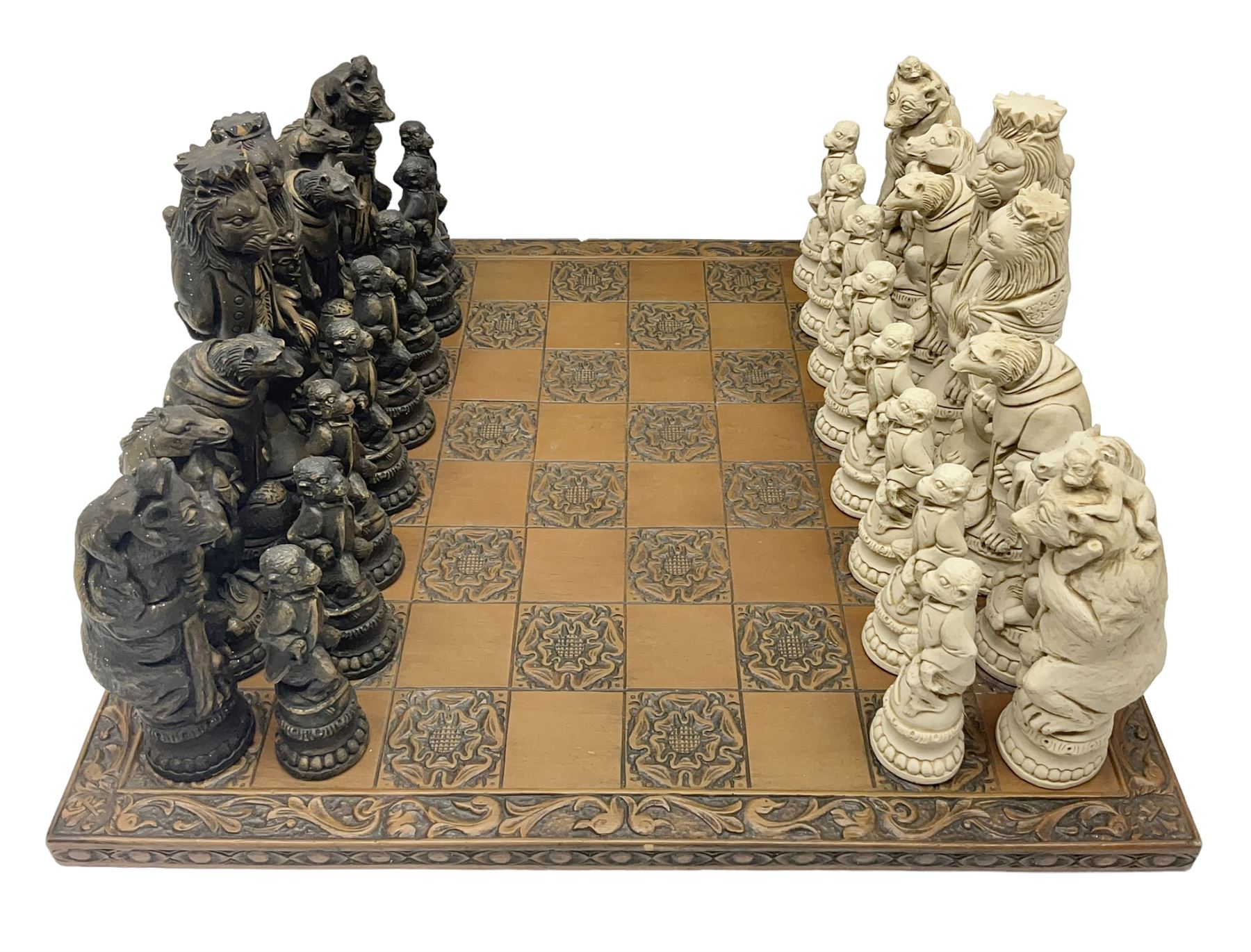 Chess set and resin chess pieces moulded as various animals, the pawns as monkeys, Kings as lions etc, board L46cm, W46cm, king H19cm