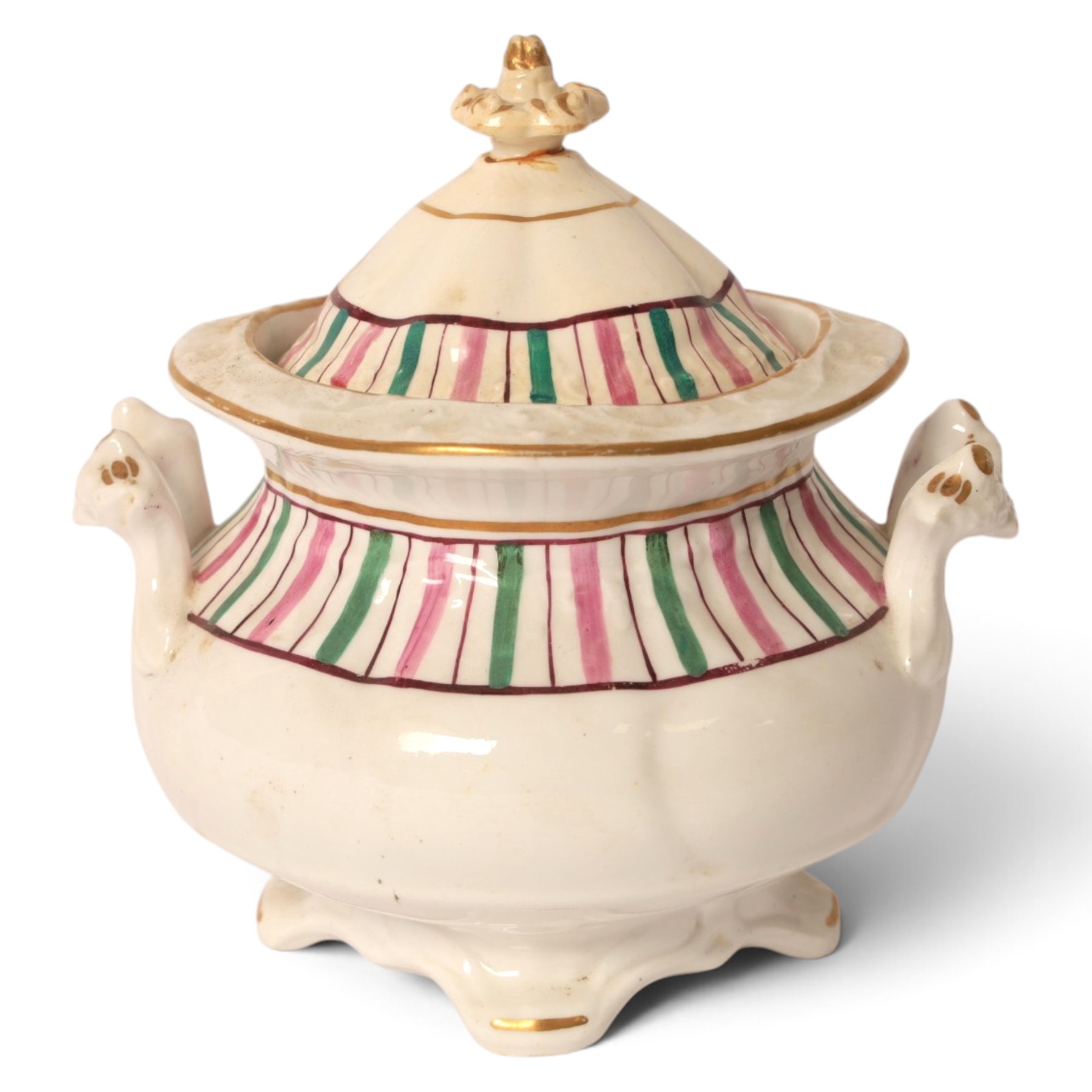 Late 19th century tea service, decorated with a green and pink strips, with internal decoration of budding branch within a gilt band upon a white glazed ground, comprising  twin handle lidded sucrier, milk jug, three serving plates, nine cups and saucers and four teacups