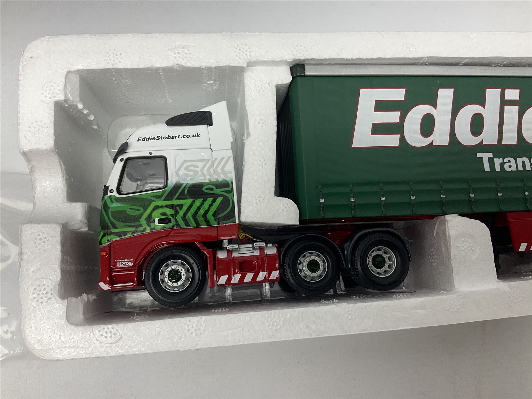 Corgi Eddie Stobart - three limited edition lorries; two Hauliers of Renown - CC13415 MAN TGA XXL Curtainside and CC14002 Volvo FH Curtainside; and  CC12607 Scammell Crusader Tautliner; all boxed (3)