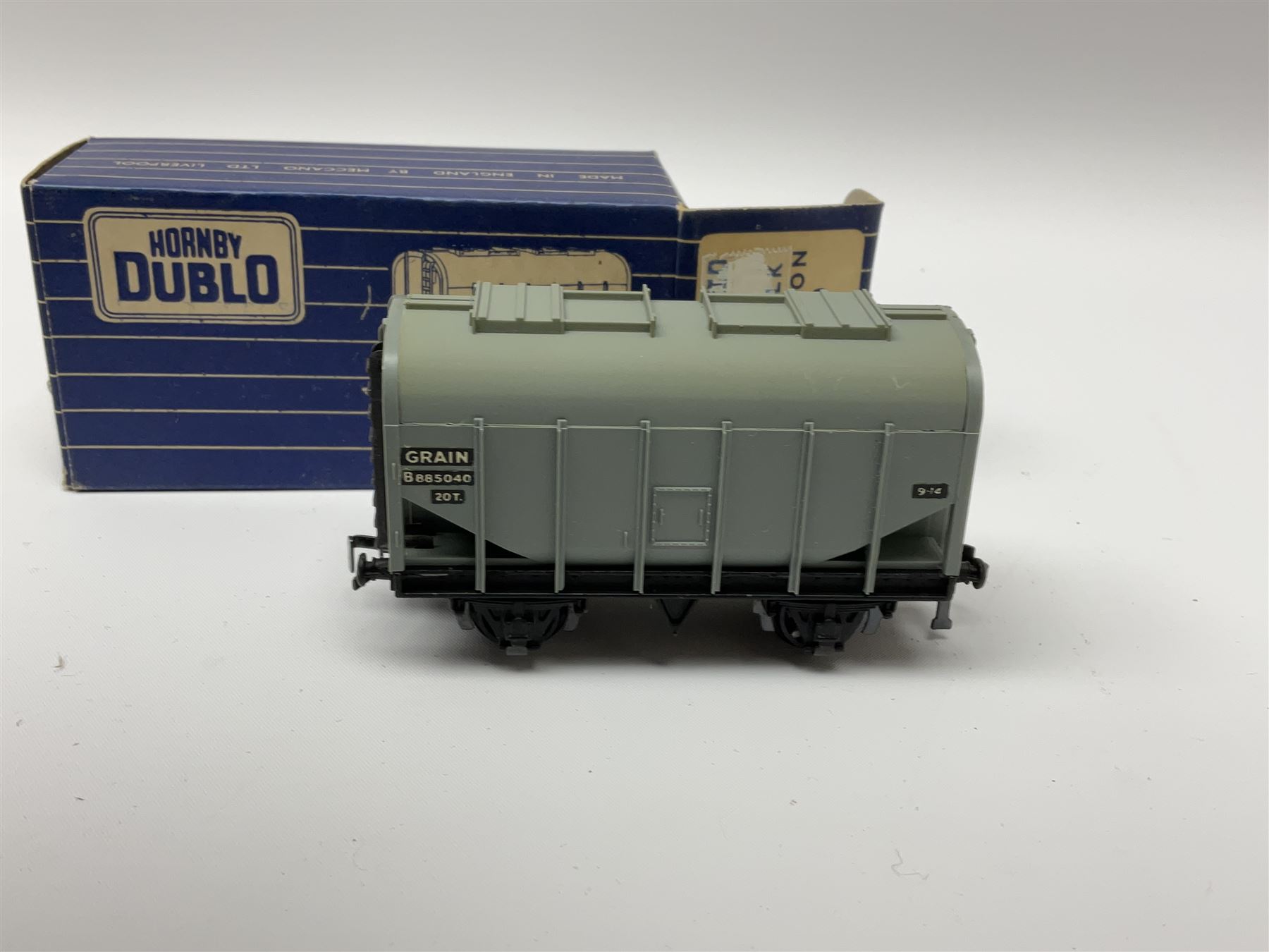 Hornby Dublo - twenty wagons including Cattle Trucks; Low-Sided Wagons; Cable Drum Wagons; Tank Wagon for Shell Lubricating Oil; Mineral Wagons; 20-Ton Bulk Grain Wagons; Goods Brake Vans; Furniture Containers etc; all in blue striped boxes (20)