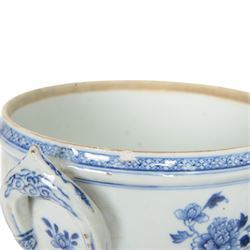 Late 18th/early 19th century Chinese export blue and white tureen and cover, the body with twin curved handles, the pieced and domed cover with multi flower head finial, painted with peonies, rockwork, and fences, overall H26.5cm D22cn 