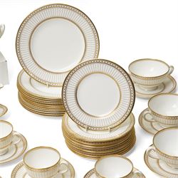 Wedgwood 'Colonnade' pattern dinner and tea service comprising twelve dinner plates, twelve dessert plates, nine soup bowls and stands, pair of covered vegetable dishes, sauce boat and stand, eight tea cups and saucers, thirteen tea plates, milk jug and sugar bowl