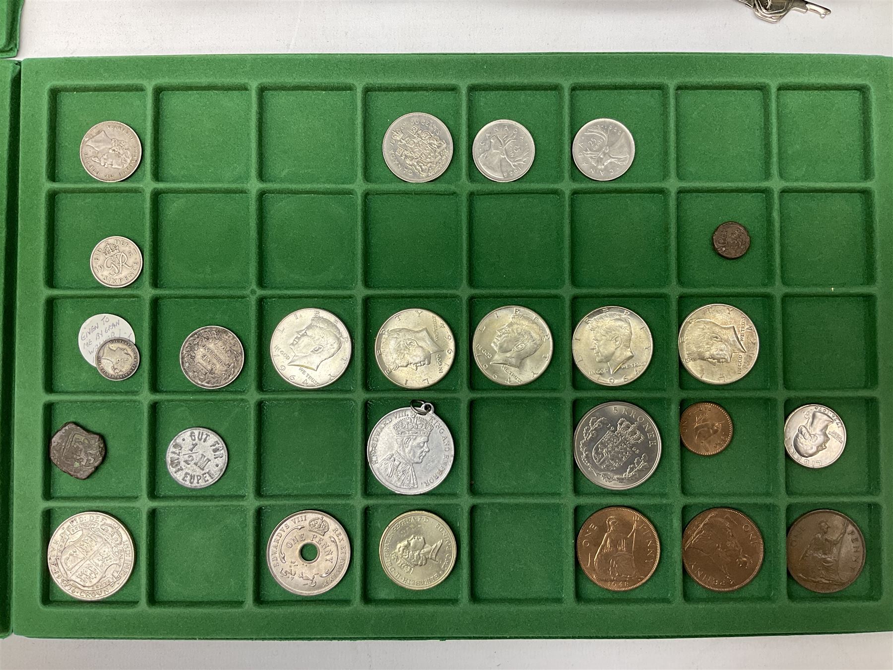 Coins and medallions including, York 1811 one shilling cattle and barber silver token, United States of America 1883O silver Morgan dollar, birds of destiny medal by Malcolm Appleby, Great British King George V 1930 halfcrown, King Edward VII 1902 silver medal, King George V 1916 halfcrown etc, housed in a case with lift out green coin trays