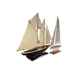 Two yacht models, together with frame International Code of Signals and another framed diorama, largest yacht, H95cm