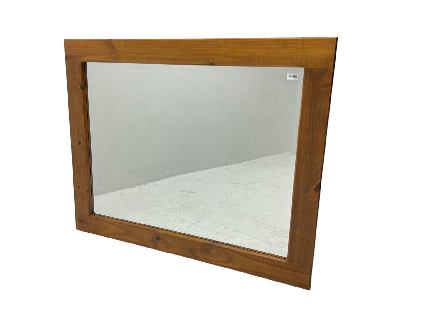 Large pine framed wall mirror, rectangular bevelled plate