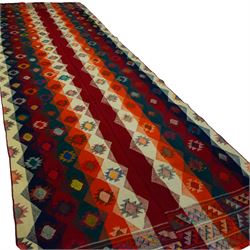 Southwestern Persian Jajim kilim, flat woven in bold bands of crimson, orange, cream, and indigo, decorated with rows of hooked diamond and star motifs 