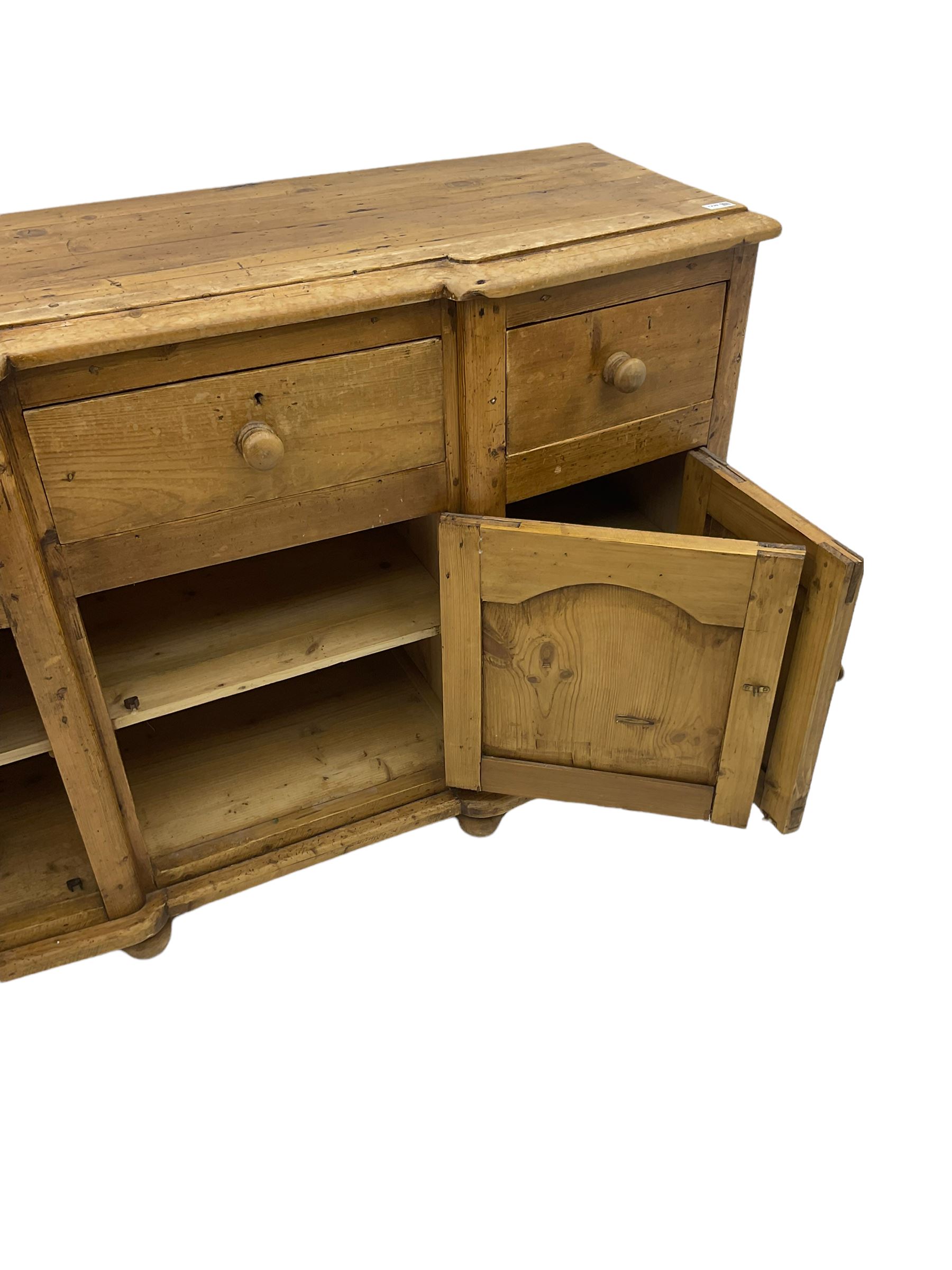 Stripped pine dresser, fitted with three drawers and three cupboards