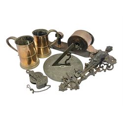 Two 19th century copper tankards, one with weighted wooden base, together with copper and wooden mechanical bellows, sundial and other metalware 