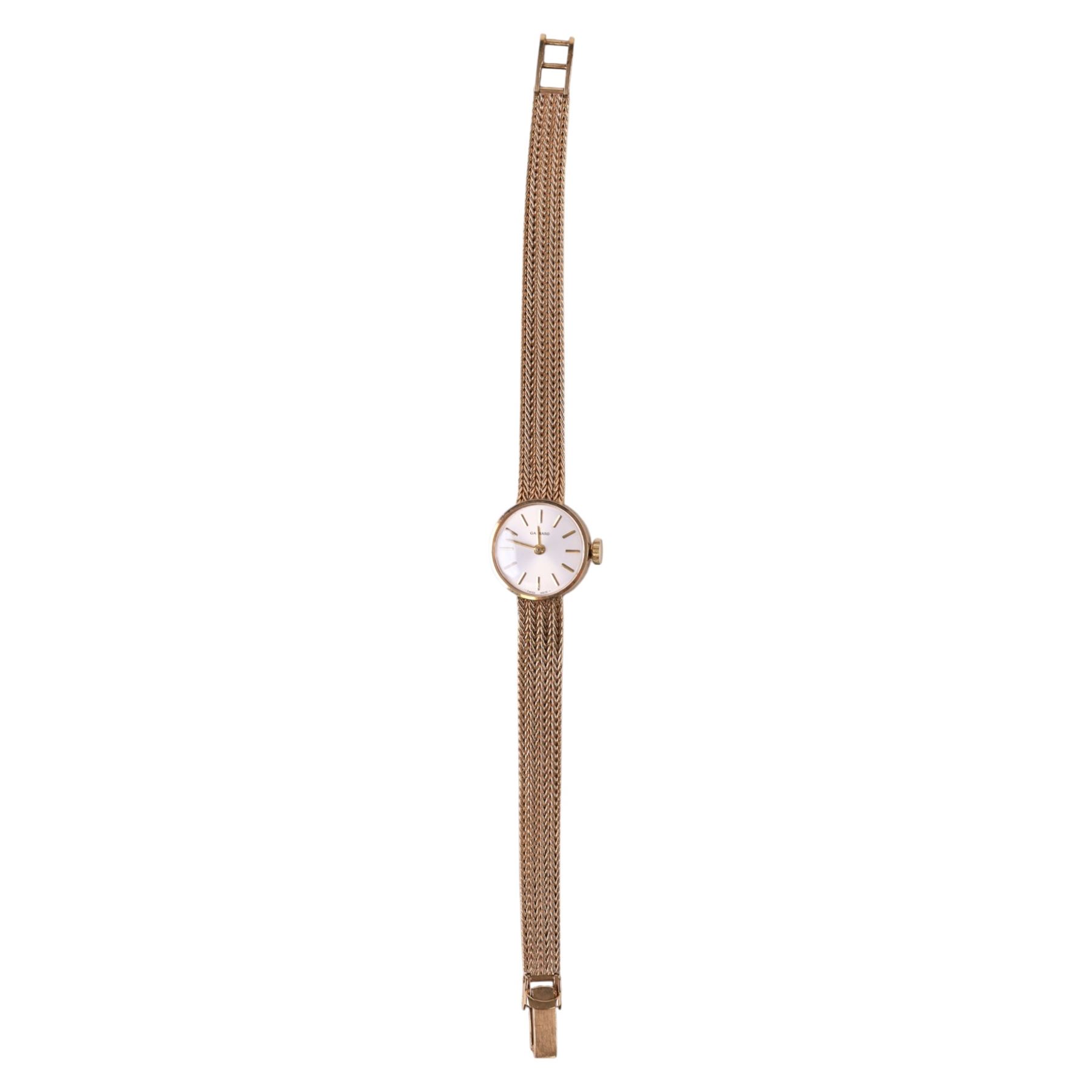 Garrard ladies 9ct gold manual wind presentation wristwatch, on integral 9ct gold bracelet, hallmarked