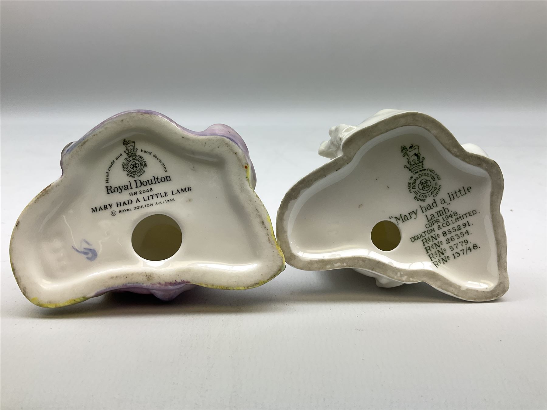 Seven Royal Doulton figures from the Nursery Rhymes Collection comprising, Tom Tom, the piper's son HN3032, Little Jack Horner HN3034, Wee Willie Winkie HN3031, Polly, put the kettle on HN3021, Little Bo-peep HN3030, Little Boy Blue HN3035, Little Miss Muffet HN2727, together with two Royal Doulton Mary had a little lamb figures HN2048 and COPR1948, all with printed marks beneath  