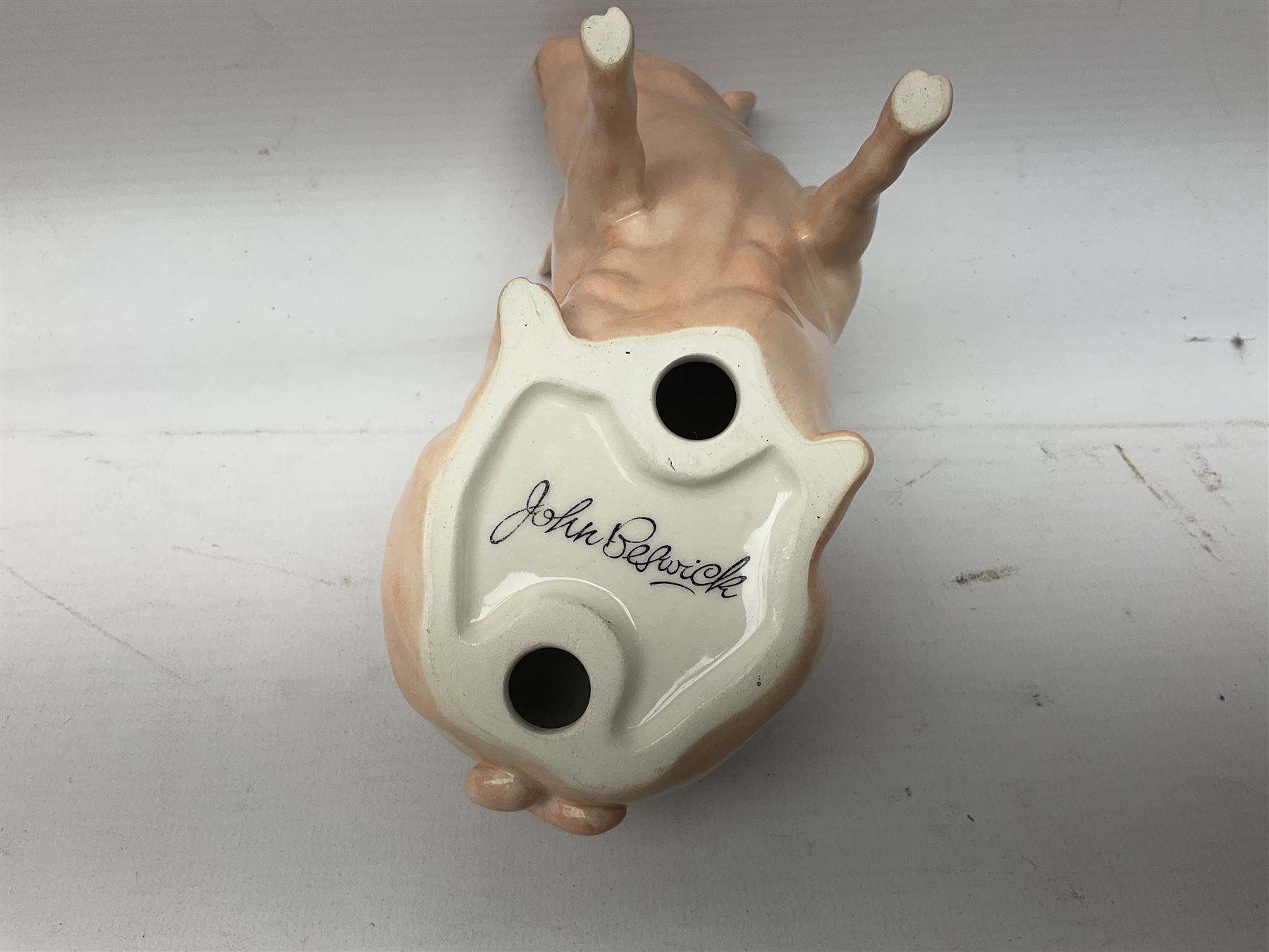 Collection of Beswick pig figures, to include John Beswick Little Likeables ‘Hide and Sleep’, white boar pig and John Beswick trio of pigs, all marked beneath (5)