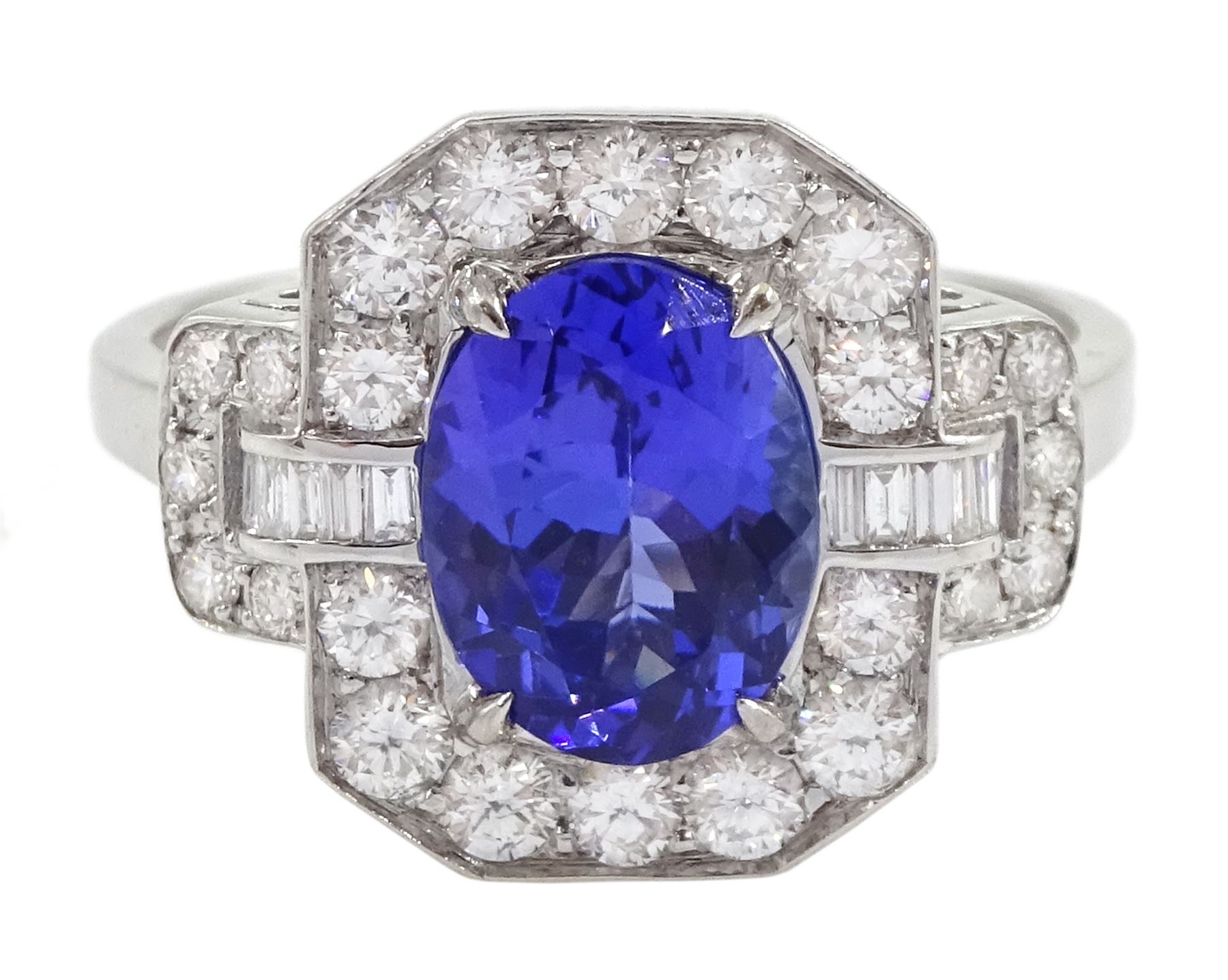 18ct gold oval tanzanite, round and baguette cut diamond cluster ring, stamped 750, tanzanite approx 1.85 carat, total diamond weight approx 0.70 carat