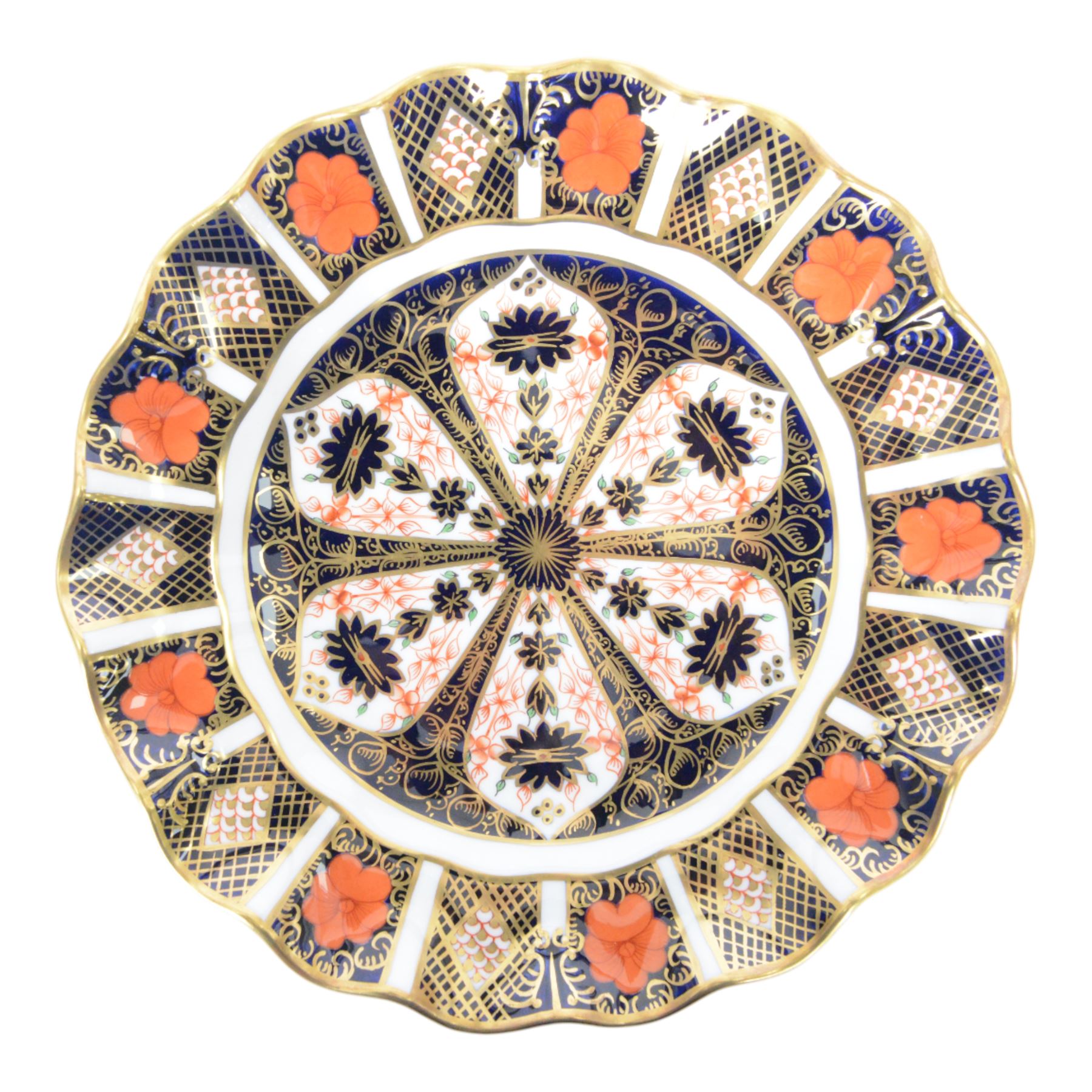 Royal Crown Derby Imari pattern 1128, two plates with fluted rim, together with Royal Crown Derby platter in pattern 6299, plates D22cm
