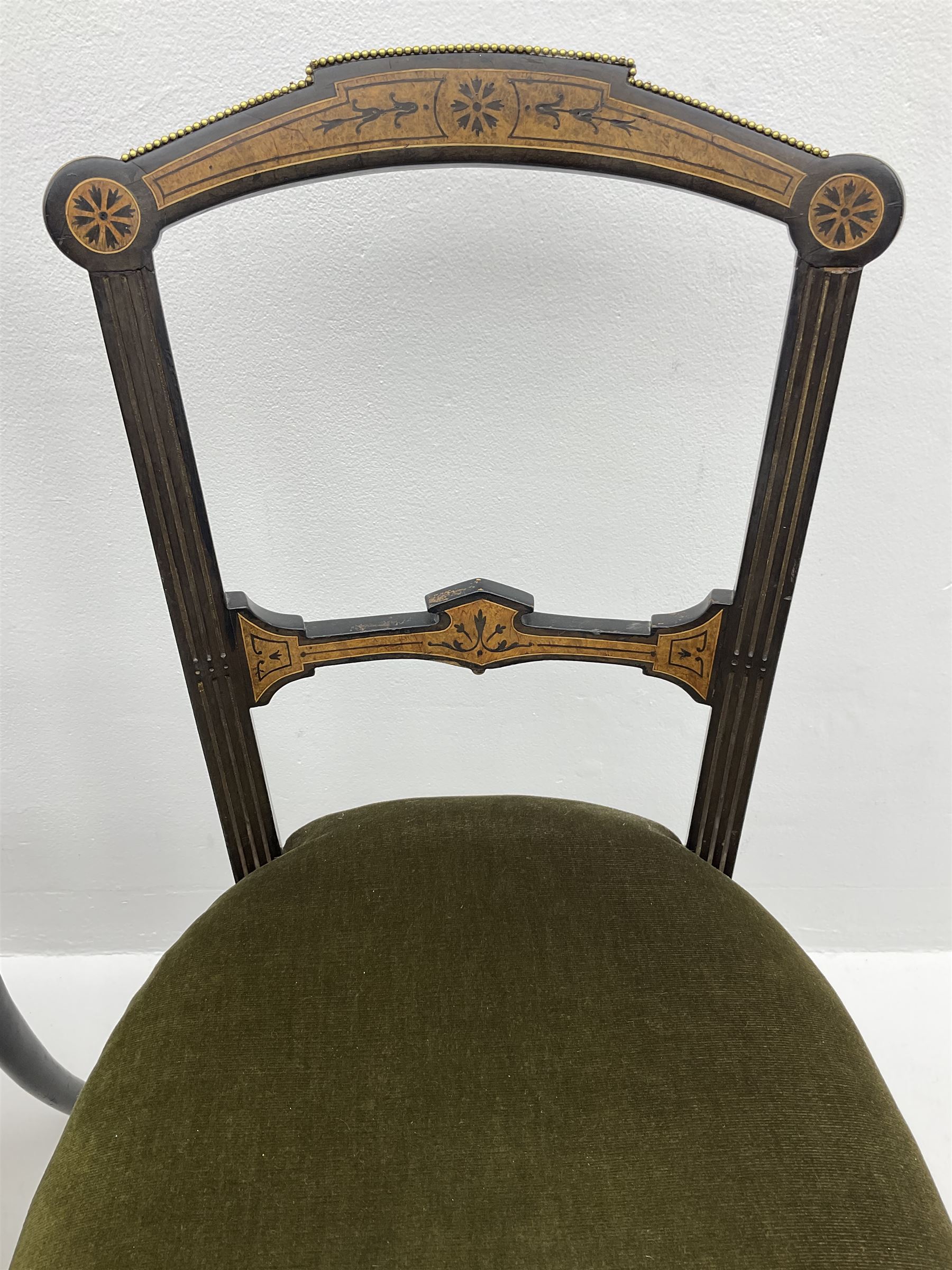 Set three late Victorian salon side chairs, ebonised frames inlaid with amboyna wood, with applied brass beading, turned and fluted supports with gilt detail