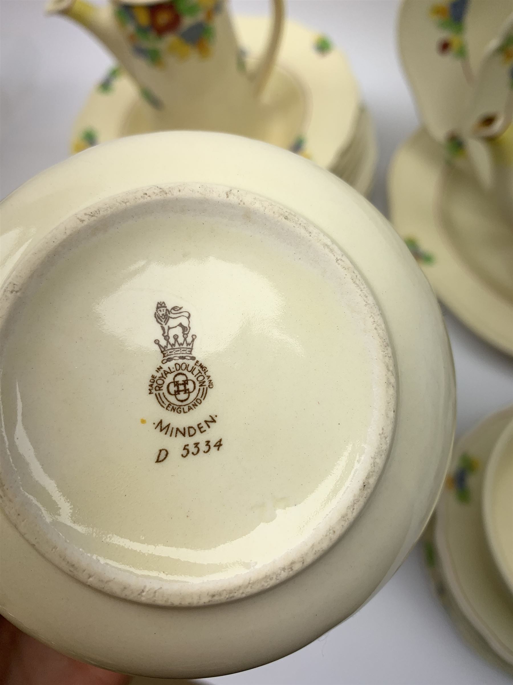 Royal Doulton Minden pattern dinner and tea wares, number D5334, together with a selection of silver plated flatware, most marked for Walker & Hall. 