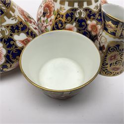 Pair of Royal Crown Derby 6299 imari pattern miniature vases, together with a miniature pitcher and dish in 2451 imari pattern, all with printed marks beneath, vase H12cm 