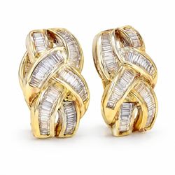 Pair of 18ct gold baguette cut diamond earrings, each stud channel set with baguette cut diamonds, stamped K18, total diamond weight 1.16 carat