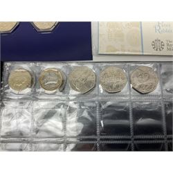 Various The Royal Mint commemorative fifty pence coins, including Beatrix Potter some being housed in folders or displays, other similar commemorative coins, Queen Elizabeth II old style two pound coins etc and five Bank of England Cleland banknotes comprising three five pounds and two ten pounds