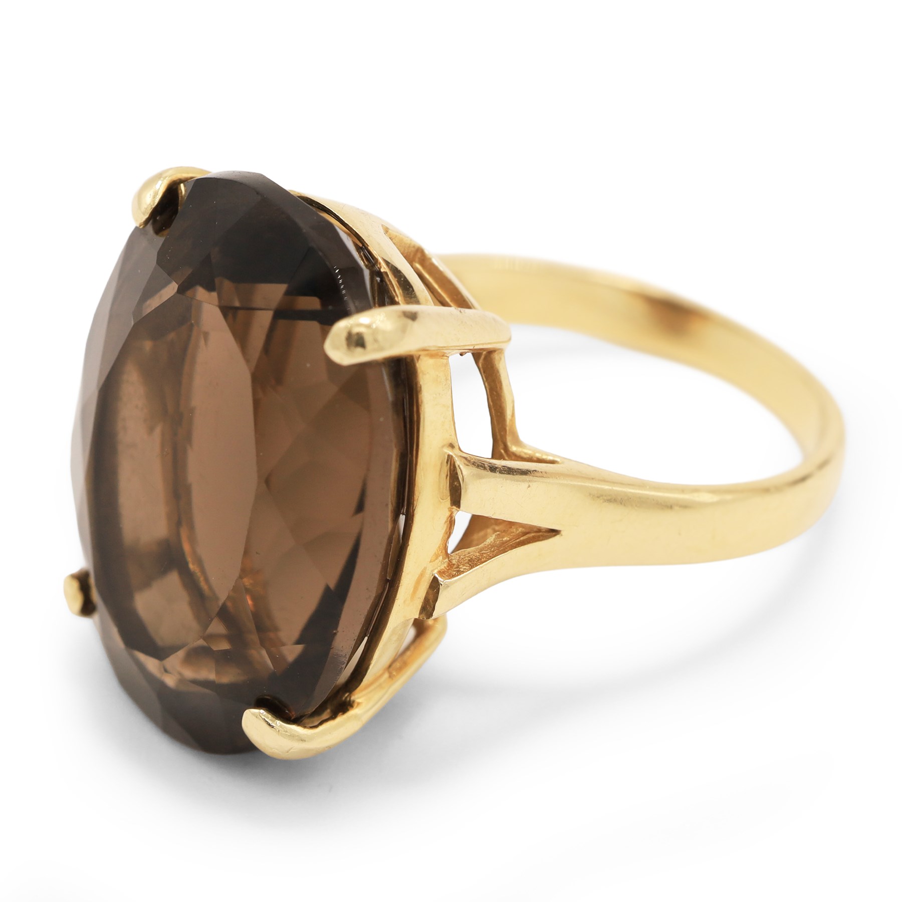 14ct gold smokey quartz ring, four claw set with a single oval cut quartz, stamped