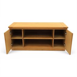 Contemporary light oak television or media unit, two cupboards and two open shelves