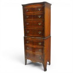 Queen Anne style burr walnut serpentine chest on chest, the upper chest with four graduating drawers with burr fronts and cross banded edges and pierced brass handles, the bottom chest with brushing slide above three graduated drawers, shaped lower apron on splayed feet 