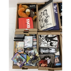 A very large collection of assorted Elvis Presley related memorabilia, to include books, records, CD's, tape cassettes, VHS's, ceramics, posters, etc. 