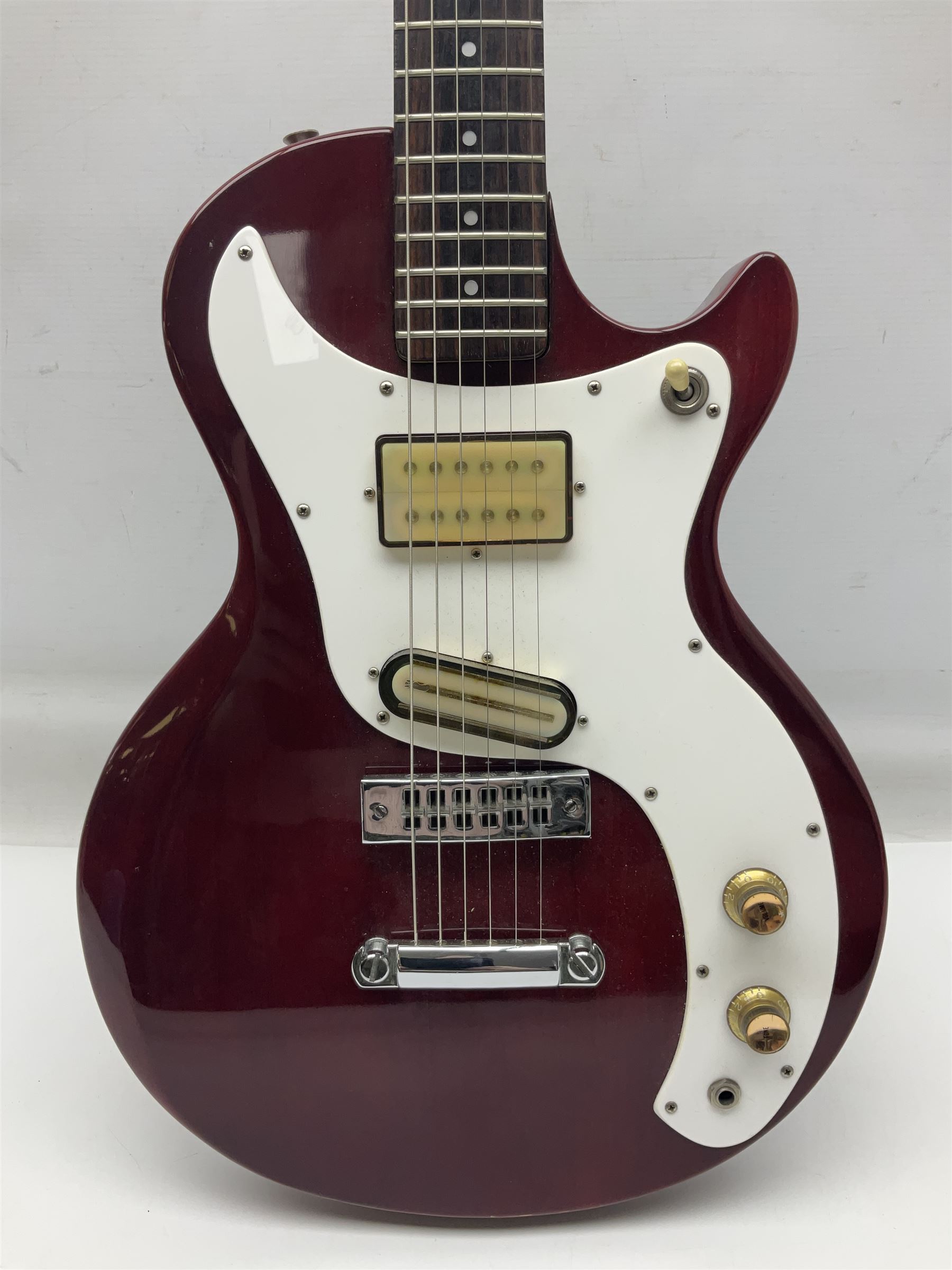 Gibson Marauder style six-string electric guitar with cherry coloured body, marked made in Japan L101cm; in locking hard carrying case