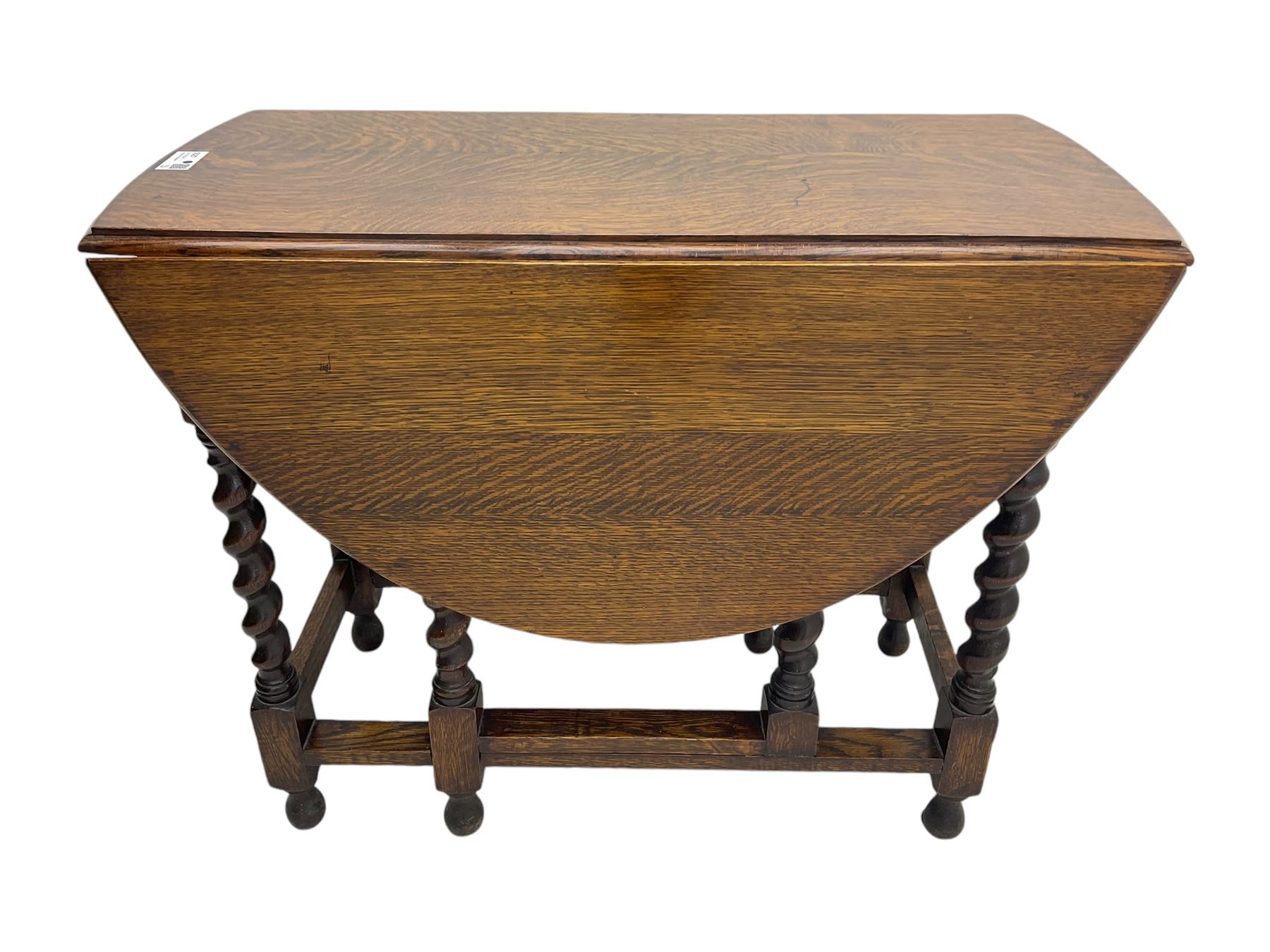 20th century oak drop-leaf dining table on spiral turned supports 