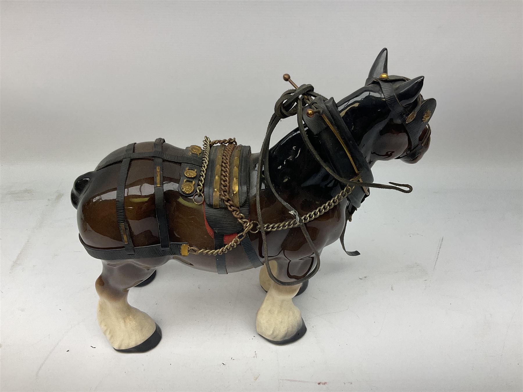 Four Melba Ware Shire horse figures and another similar, and three wood carts