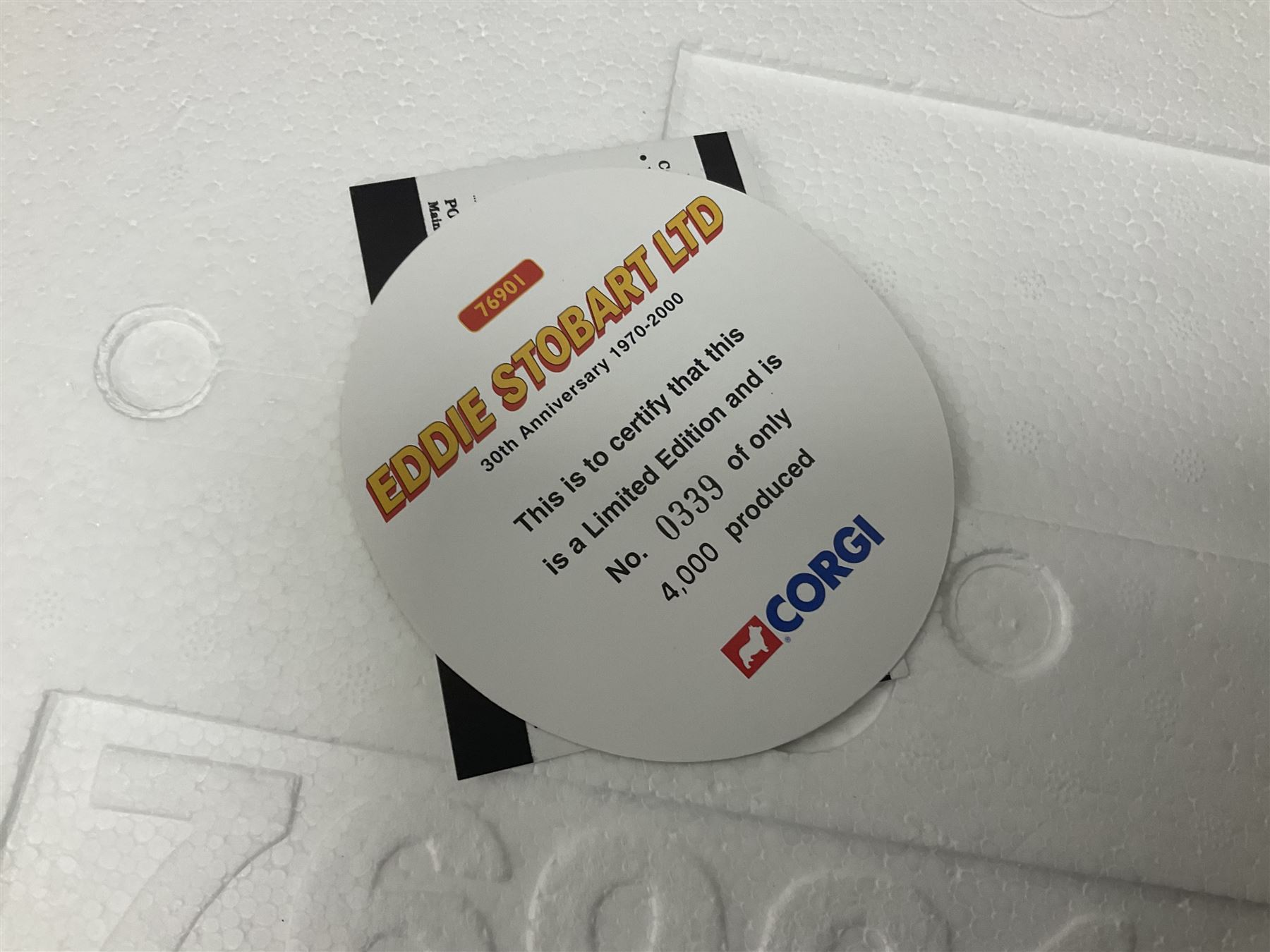 Corgi - three limited edition Eddie Stobart sets - 76901 30th Anniversary 1970-2000; boxed with delivery packaging; CC99155 Scania@Stobart; and CC86610 The Eddie Stobart Story; both boxed (3)