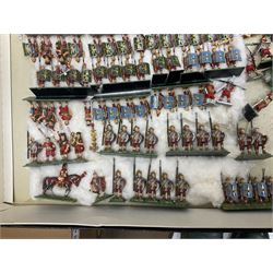 Painted metal wargame figures - over four hundred including Normans and Saxons, Romans, British Tribes etc; together with a quantity of part-painted and unpainted figures, battlefield weapons and accessories etc; average size 25mm
