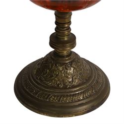 Victorian oil lamp, the brass base supporting cranberry glass reservoir, with clear glass chimney and cranberry shade with fluted rim, overall H59cm