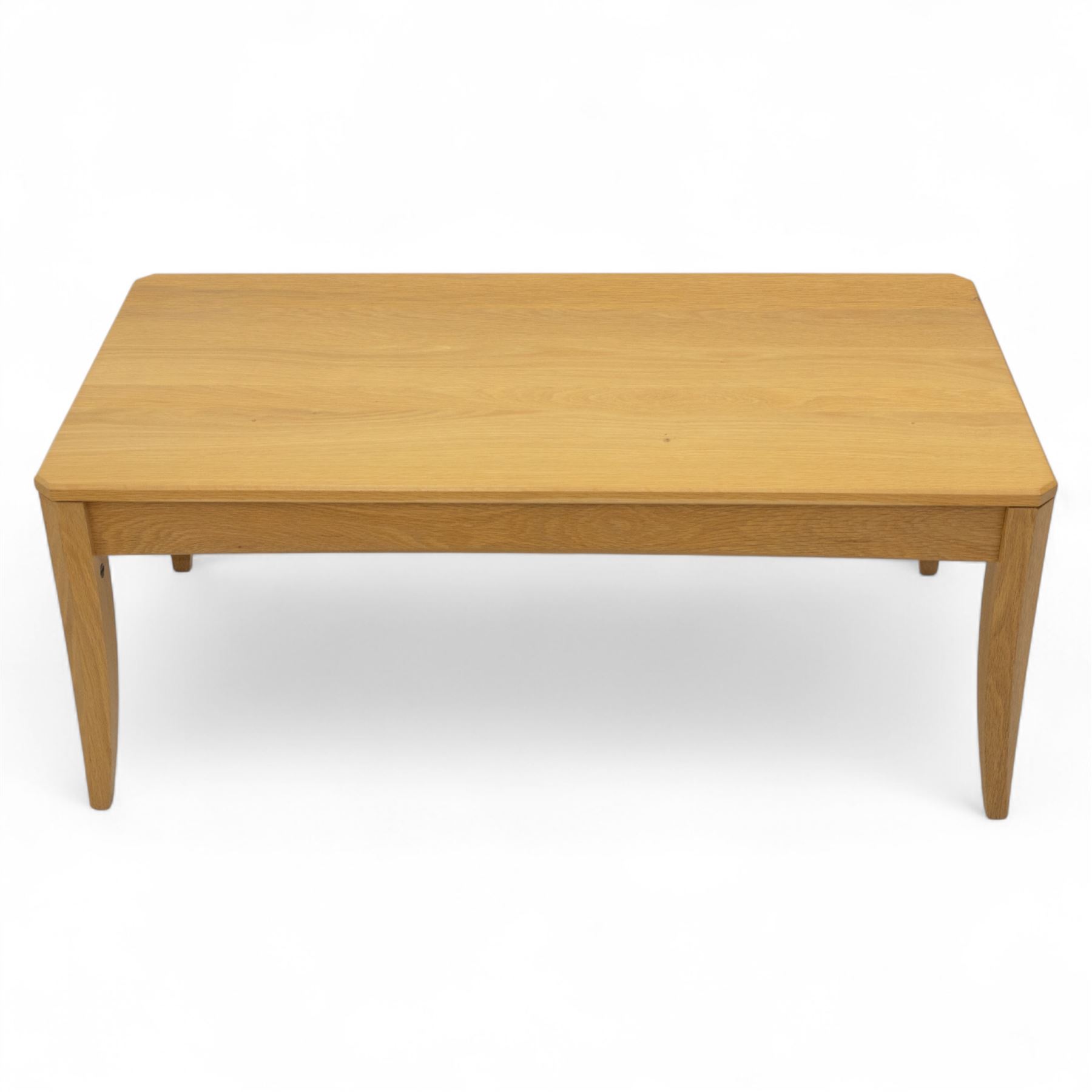 Ercol - light oak ‘Artisan’ coffee table, of rectangular form with chamfered top and gently tapered legs