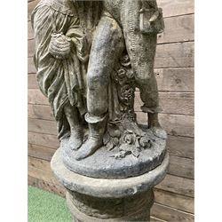 Romeo & Juliet - cast stone garden figure raised on circular fluted column - THIS LOT IS TO BE COLLECTED BY APPOINTMENT FROM DUGGLEBY STORAGE, GREAT HILL, EASTFIELD, SCARBOROUGH, YO11 3TX