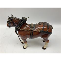 Four Melba Ware Shire horse figures and another similar, and three wood carts