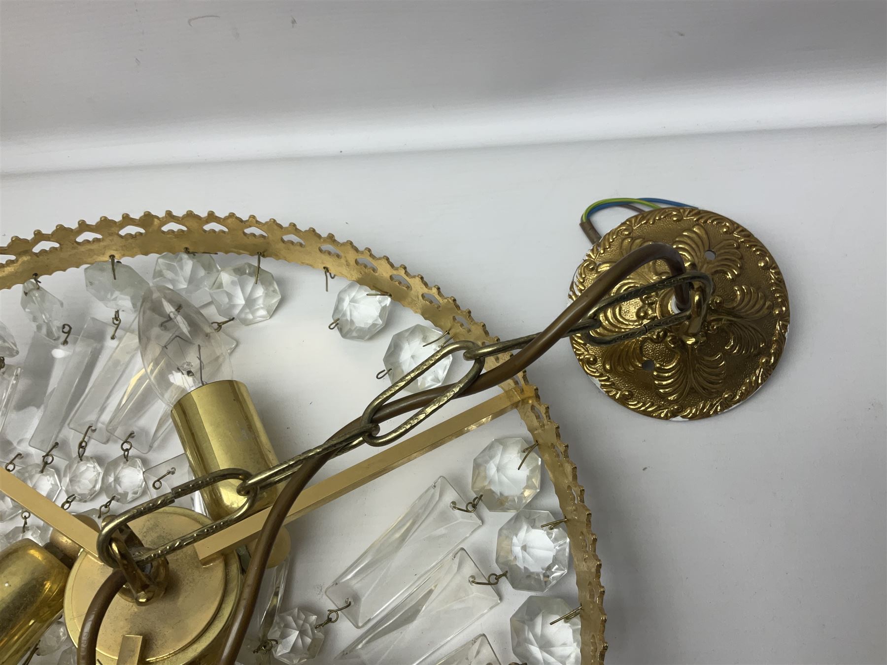 Pair of Marks and Spencer adjustable wall lights, together with a glass chandelier