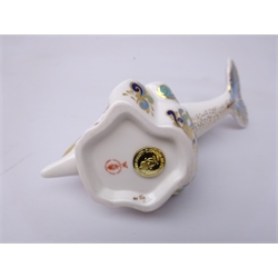  Three Royal Crown Derby paperweights: Oceanic Whale designed exclusively for the Royal Crown Derby Collectors Guild dated 2004, L22cm, Striped Dolphin, gold stopper and another Dolphin, silver stopper (3)  