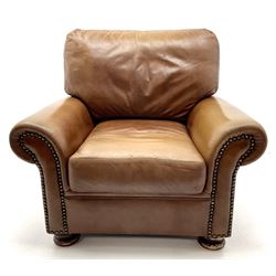 Three seat studded tan leather sofa, scrolling arms, turned supports (W190cm) with matching two seat (W155cm) armchair (W100cm) and footstool 