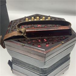 Lachenal & Co two-row concertina, with twenty-one buttons on pierced mahogany hexagonal ends; five-fold bellows and inset maker's label; serial no.108826 L18.5cm; in black covered case