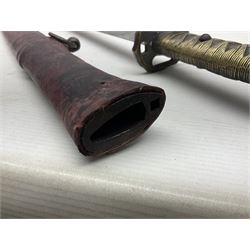 Copy of a WWII Japanese NCO sword, the 65cm slightly curving blade stamped with pseudo Japanese characters and cast brass simulated cord bound grip; in officer's leather bound field scabbard L97cm overall