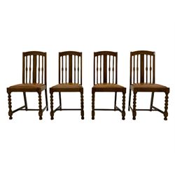 Set of four early 20th century oak dining chairs, the cresting rails decorated with applied blind fretwork decoration, leather drop in seats, on spiral turned supports