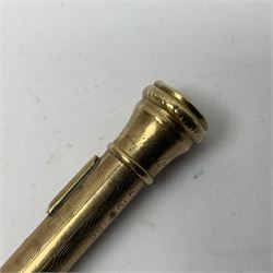 9ct gold 'Lifelong' propelling pencil, with engine turned decoration, stamped 9ct 