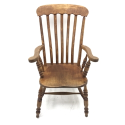 Victorian elm and beech farmhouse armchair, turned supports joined by stretcher, W64cm