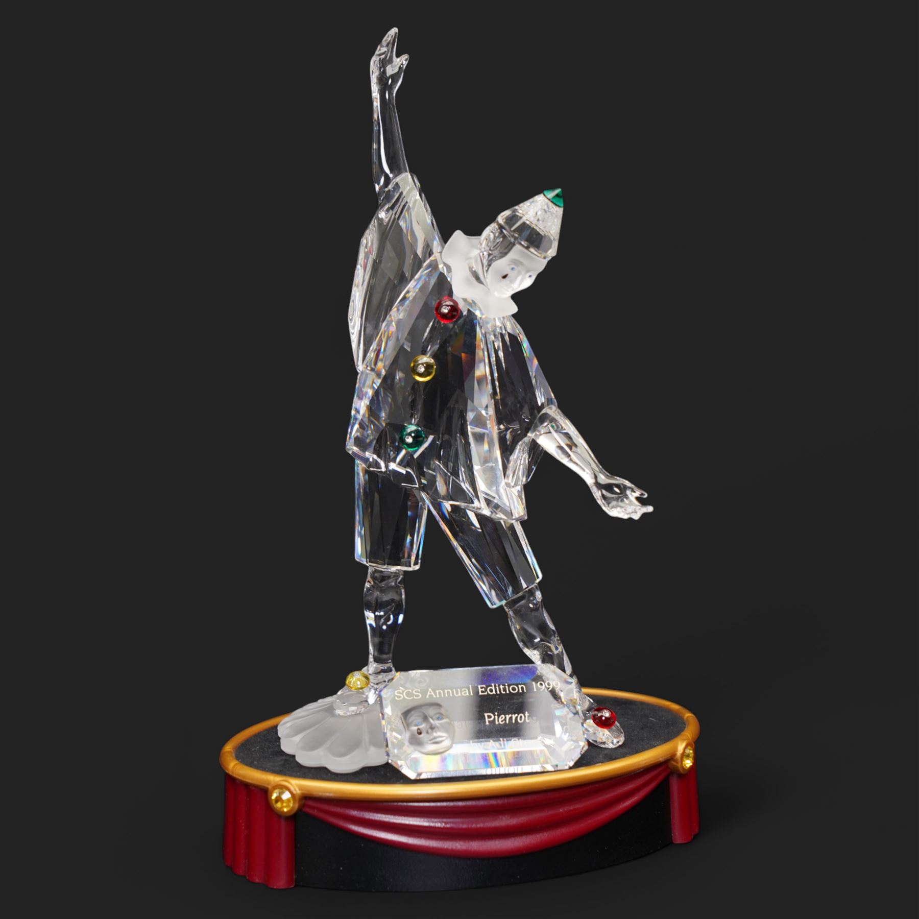 Swarovski crystal 'Masquerade' trilogy; 1999 Masquerade Pierrot, 2000 Columbine, 2001 Harlequin all with accompanying plaque, stand and original box