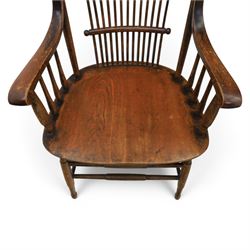 Set of eight 19th century ash and elm spindle back Windsor armchairs, arched top rails above fan-shaped spindle backs, curved arms with turned supports, shaped saddle seats, on turned legs joined by H-stretchers